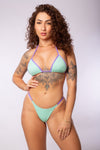 TOP TRIÁNGULO LUREX TURQUESA CON LILÁS