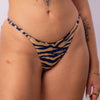 TANGA REGULABLE CEBRA NUDE CON AZUL MARINO